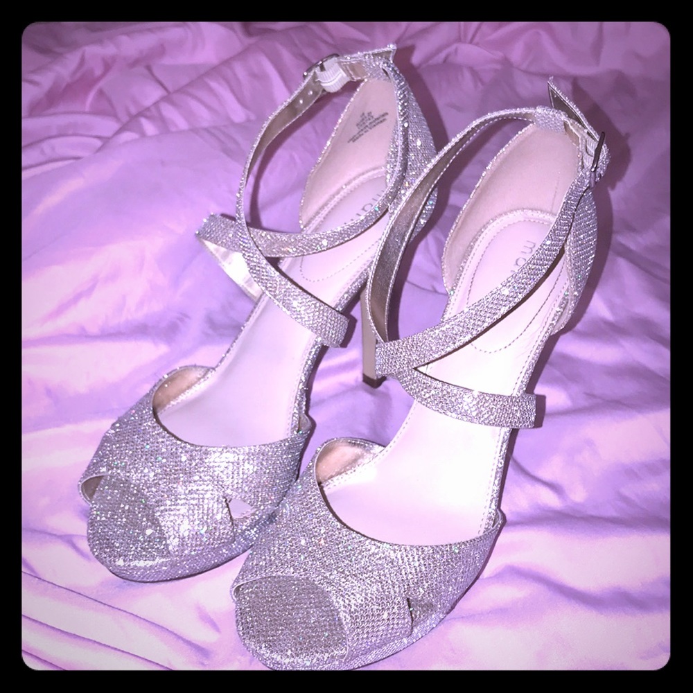 Silver prom heels with adjustable strap.